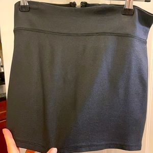 Black Pleather Bebe mini skirt. Size small